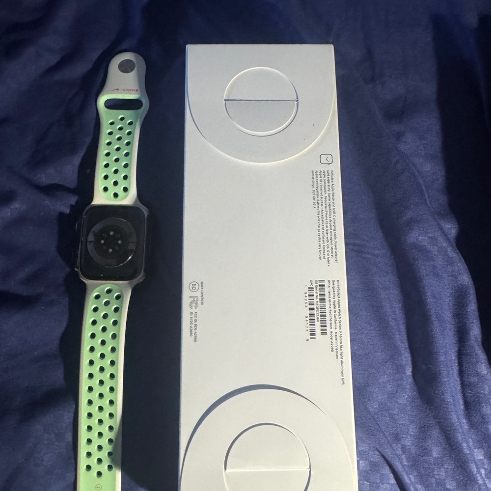 Apple Smartwatch with Green and Black Band